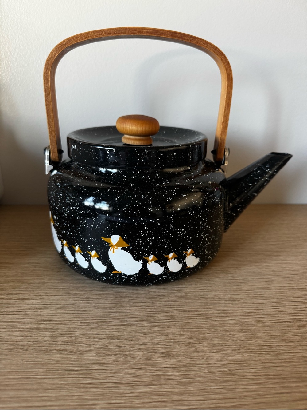 Black Speckled Kettle with Duckling Print and Wood Handles